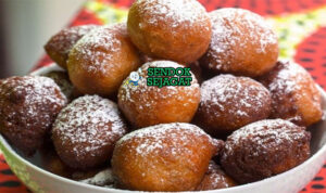 Puff Puff Renyah Gembung Khas Nigeria Puff Puff golden gembung tabur gula halus tumpuk tinggi di paper bag Nigeria