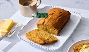 Pumpkin Bread loaf iris moist rempah walnut di piring saji