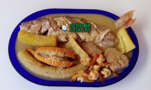 Rondón One Pot Mewah Khas Karibia Rondón panci besar kuah santan ikan snapper kepiting udang pisang hijau yuca lime avocado
