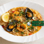 Arroz de Marisco nasi kuning saffron seafood udang cumi kerang tomat paprika coentros lemon roti