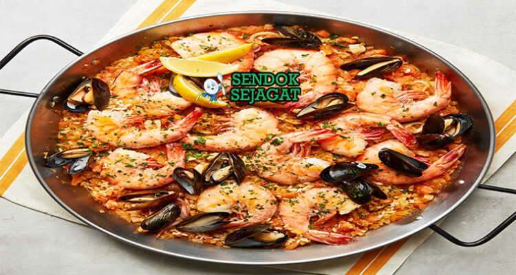 Australian Seafood Paella prawns barramundi saffron rice lemon roasted capsicum parsley paella pan