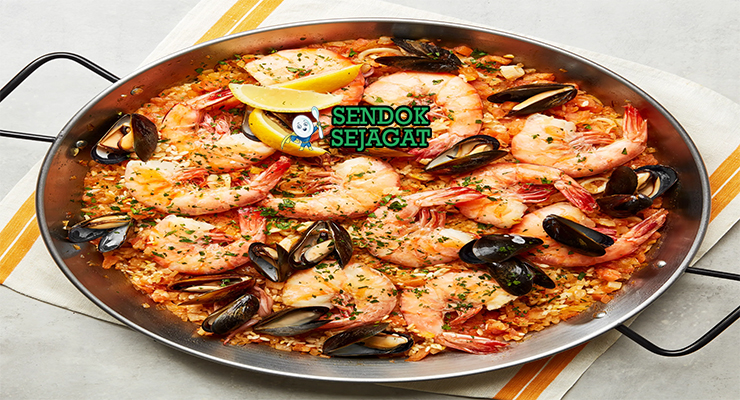 Australian Seafood Paella prawns barramundi saffron rice lemon roasted capsicum parsley paella pan