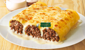 Canelones Meleleh Gurih Khas Montevideo Uruguay Canelones Uruguay gulung pasta isi daging ham bechamel saus tomat parmesan golden parmesan gratinado