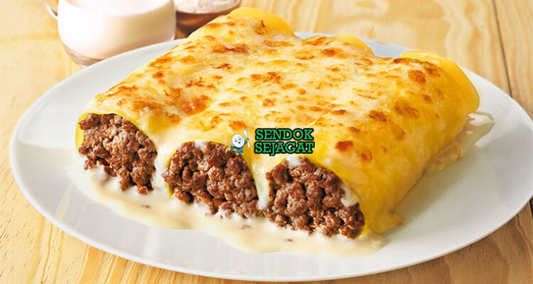 Canelones Uruguay gulung pasta isi daging ham bechamel saus tomat parmesan golden parmesan gratinado