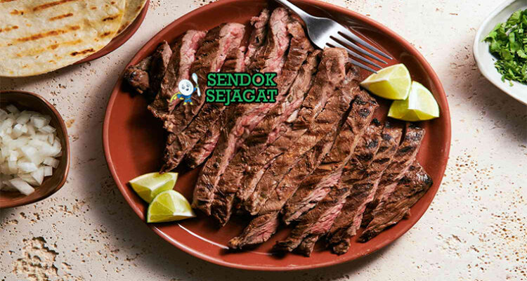 Carne Asada irisan steak panggang charred flank skirt taco tortilla guacamole pico de gallo onion cilantro limau