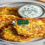 Corn and Zucchini Fritters tumpukan golden garing jagung zucchini feta poached egg avocado smash relish