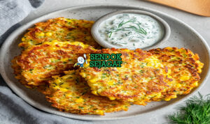 Corn and Zucchini Fritters tumpukan golden garing jagung zucchini feta poached egg avocado smash relish