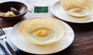 Hoppers Appa Renyah Bowl Khas Sri Lanka Hoppers appa bowl shape crispy edge soft center egg in middle pol sambol curry leaves