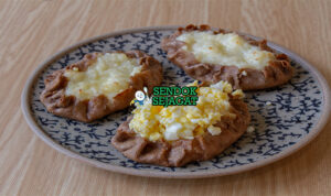 Karelian Pasties Renyah Creamy Khas Finlandia Karelian Pasties karjalanpiirakka rye oval golden ripped edge isi bubur nasi egg butter munavoi telur ham