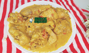 Kuku wa Nazi Santan Gurih Khas Pantai Kenya Kuku wa Nazi ayam potong kuah santan kuning kunyit cabe ugali nasi kelapa kachumbari limau