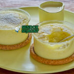 Lemon Delicious Pudding golden sponge atas saus lemon creamy bawah whipped cream lemon zest