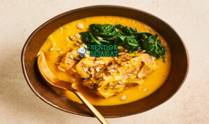 Miyan Taushe Creamy Umami Khas Hausa Nigeria Miyan Taushe kuah kacang tanah kental labu kuning yakuwa hijau daging sapi dawadawa dengan tuwo shinkafa