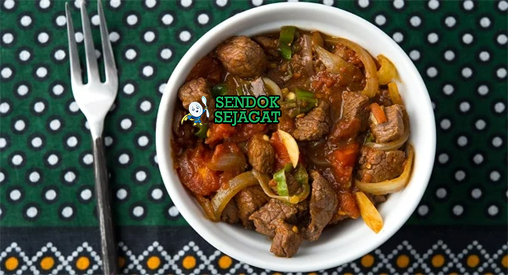 Tibs daging sapi tumis pedas berbere niter kibbeh cabe jalapeño bawang injera wajan besi