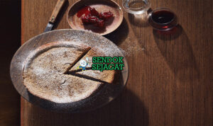 Wattle Seed Latte Cheesecake Nutty Creamy Khas Sydney Wattle Seed Latte Cheesecake slice tinggi Anzac base cream cheese latte wattle seed dust damper cream