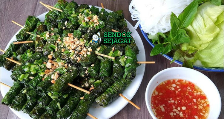 Bò Nướng Lá Lốt khas Vietnam, daging sapi cincang bungkus daun sirih panggang golden harum, disajikan dengan nước chấm rau sống bún tươi, sajian Saigon autentik