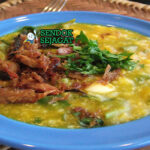 Bubur Tinutuan beras merah sayur hijau ikan asin teri sambal dabu-dabu telur rebus lalapan Manado