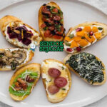 Crostini khas Italia, roti panggang renyah dengan topping tomat basilico, paté hati, kacang cannellini, parmigiano, minyak zaitun, sajian cicchetti Toscana autentik