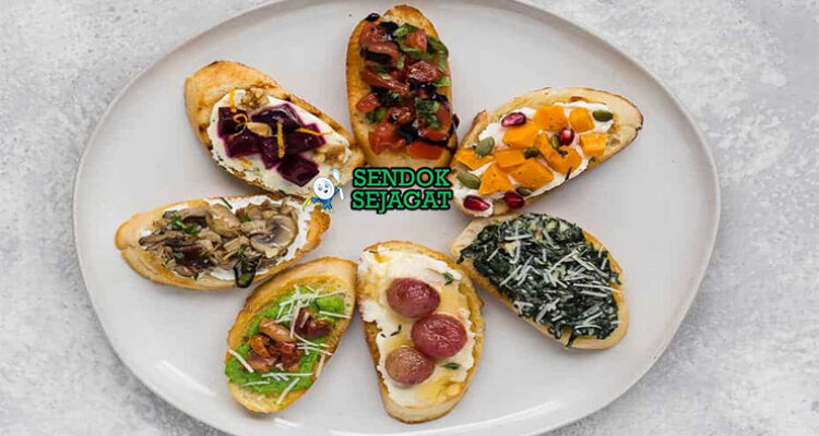 Crostini khas Italia, roti panggang renyah dengan topping tomat basilico, paté hati, kacang cannellini, parmigiano, minyak zaitun, sajian cicchetti Toscana autentik