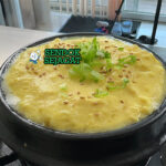 Gyeran-jjim telur kukus lembut mengembang daun bawang wijen ddukbaekgi panci tanah liat nasi kimchi