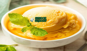 Mango Sorbet es mangga creamy halus scoop di cone waffle kelapa parut sangrai potongan mangga segar Australia