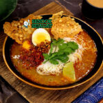 Mohinga sup mie bihun kuah kaldu ikan patin lemongrass telur bawang goreng calamansi cabe daun ketumbar