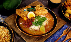 Mohinga sup mie bihun kuah kaldu ikan patin lemongrass telur bawang goreng calamansi cabe daun ketumbar