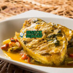Moqueca de Peixe ikan kerapu santan dendê tomat bawang cabai ketumbar piring Bahia Brasil