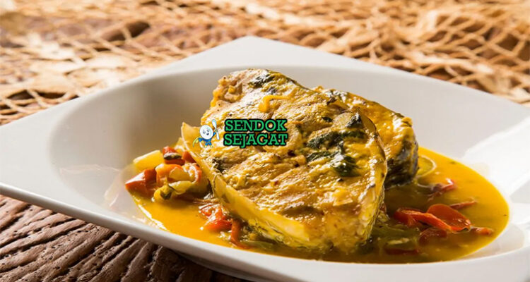 Moqueca de Peixe ikan kerapu santan dendê tomat bawang cabai ketumbar piring Bahia Brasil