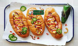 Sonoran Hot Dog bacon wrapped sosis beans tomat onion jalapeño salsa mayo mustard bolillo bun