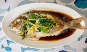 Steamed Fish with Ginger & Scallions ikan utuh kukus jahe julienne daun bawang soy sauce sizzling cilantro nasi