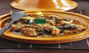 Tangia daging domba empuk saffron bawang putih preserved lemon kuah bening roti khobz pot tanah liat Marrakech