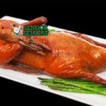 Tea-Smoked Duck bebek iris crispy kulit renyah smoky pancake hoisin daun bawang timun