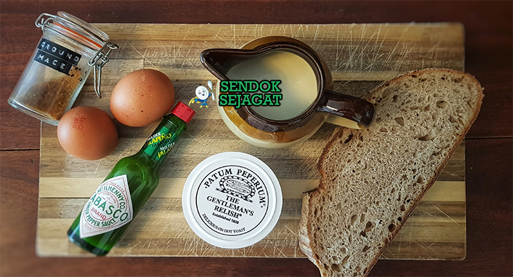 Bahan-bahan resep Scotch Woodcock termasuk roti tawar, telur, anchovy, mentega, garam, lada, dan lemon siap dimasak