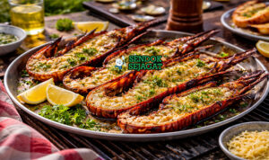 Grilled WA Marron khas Australia dengan marron segar belah panggang keemasan, oles mentega bawang putih dan lemon myrtle, disajikan hangat di piring dengan irisan lemon