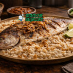 Mashuai khas Oman dengan ikan kingfish panggang utuh renyah, nasi lemon harum, tampak gurih menggugah selera