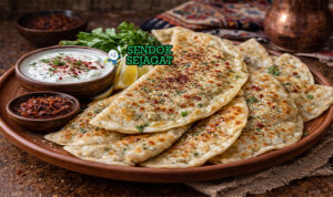 Qutab khas Azerbaijan dengan roti tipis renyah kecokelatan, isian daging cincang gurih, tampak harum menggugah selera