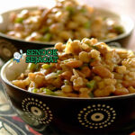 Umgqusho khas Afrika Selatan dengan jagung kering dan kacang merah rebus lembut, tampak gurih hangat menggugah selera