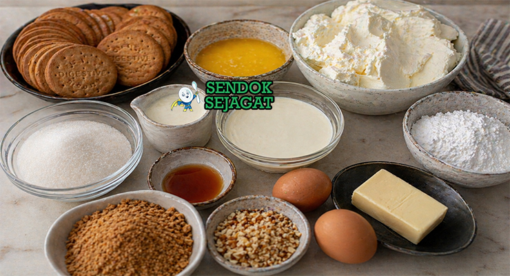 Cream cheese, biskuit, mentega, karamel, dan bahan lain tersusun rapi untuk membuat cheesecake