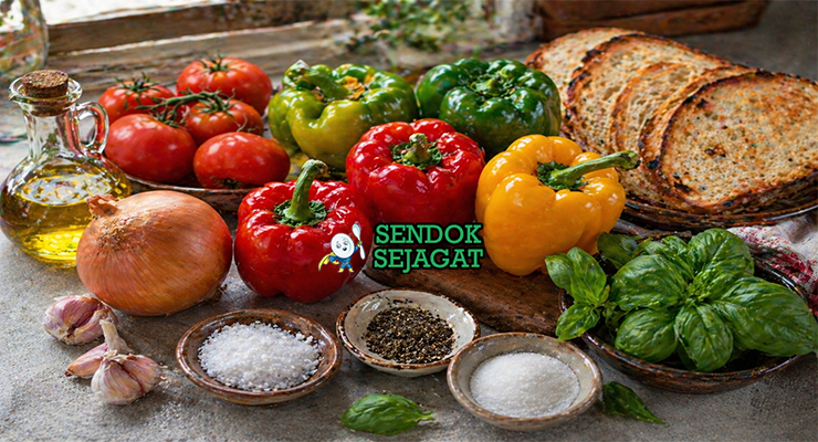 Paprika merah, kuning, hijau, bawang bombay, tomat, bawang putih, dan olive oil tersusun rapi sebagai bahan utama peperonata khas Italia
