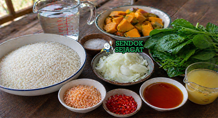 Beras putih, air, dan bahan sup seperti sayuran hijau, cabai, bawang, dan minyak kelapa sawit tersusun rapi di meja dapur