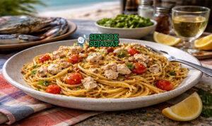 Blue Swimmer Crab Pasta khas Australia dengan spaghetti berbalut saus krim kepiting biru segar, taburan peterseli dan keju parmesan, disajikan hangat di piring