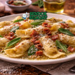 Piring casoncelli khas Bergamo berisi pasta isi berbentuk bulan sabit disiram mentega sage harum, taburan keju Parmesan dan pancetta crispy yang menggugah selera